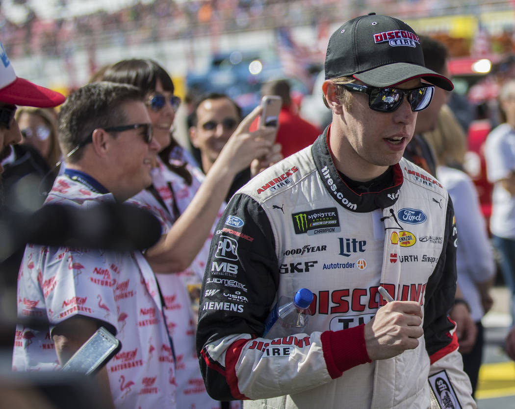 Brad Keselowski (2) walks to the podium to be announced before the start of the Monster Energy NASCAR Cup Series Pennzoil 400 on Sunday, March 3, 2019, at Las Vegas Motor Speedway, in Las Vegas. ( ...