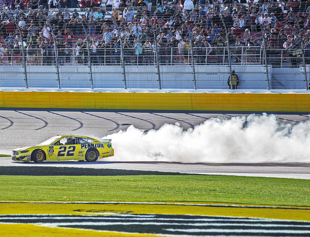 Joey Logano (22) celebrates with a burnout after winning the Monster Energy NASCAR Cup Series Pennzoil 400 on Sunday, March 3, 2019, at Las Vegas Motor Speedway, in Las Vegas. (Benjamin Hager Revi ...