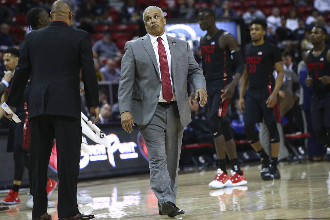 UNLV Rebels head coach Marvin Menzies reacts during the second half of a quarterfinal game against San Diego State in the Mountain West men's basketball tournament at the Thomas & Mack Center ...