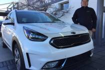 Findlay Kia sales consultant Tommy Gougou Stamos is seen with a 2019 Kia Niro at the dealership located at 5325 W. Sahara Ave. (Findlay)