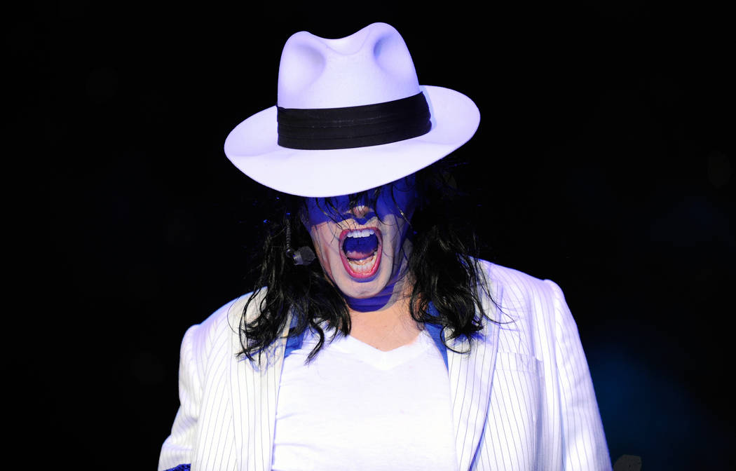 Tribute artist Michael Firestone performs as Michael Jackson during the "MJ Live a Michael Jackson Tribute" show in the Crown Theater at the Rio hotel-casino in Las Vegas, Thursday, July 26, 2012. ...