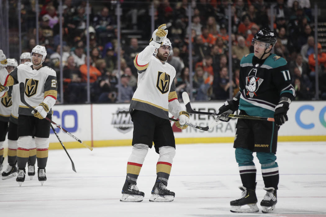 Vegas Golden Knights' Alex Tuch, center, celebrates his goal as he skates past Anaheim Ducks' Daniel Sprong during the second period of an NHL hockey game Friday, March 1, 2019, in Anaheim, Calif. ...