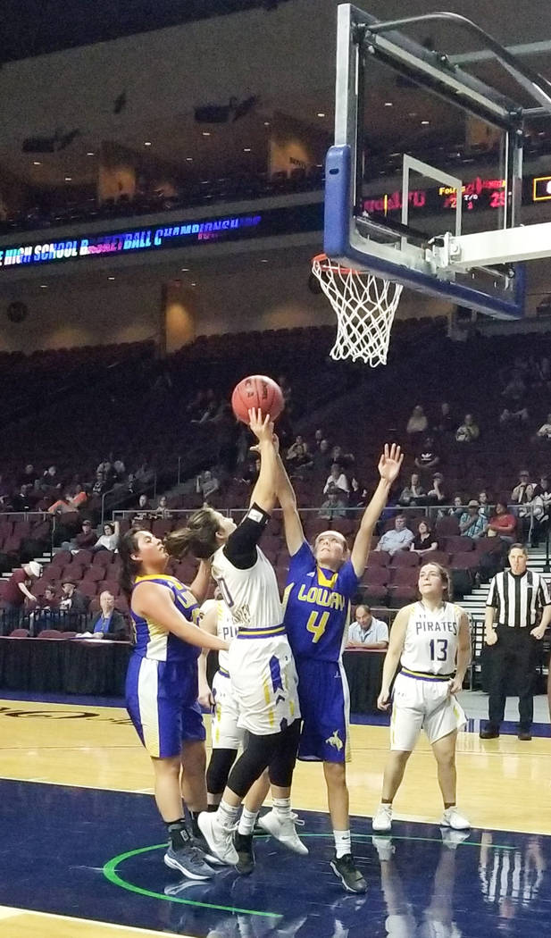 Moapa Valley's Peyton Schraft shoots over Lowry's Rebecca Kuskie in the Class 3A state semifinals at Orleans Arena on Friday, March 1, 2019. The Pirates won 43-38. (Damon Seiters/Las Vegas Review- ...