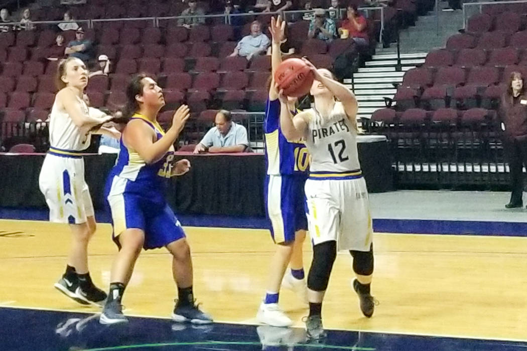 Moapa Valley's Lainey Cornwall scores a basket in the second half against Lowry in the Class 3A state semifinals at Orleans Arena on Friday, March 1, 2019. The Pirates won 43-38. (Damon Seiters/La ...