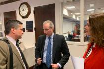 Ben Lieberman, center, an advocate for tougher distracted driving laws, speaks to Nevada Assemblyman Steve Yeager, D-Las Vegas, following a bill hearing Friday, March 1, 2019. Assemblywoman Michel ...