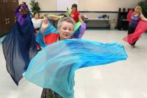 Mary Ann Teixeira, 76, front, Gloria Postal, 58, left, Guadalupe Villa Lyons, 70, second left, and Roberta Culmone, 71, right, belly dance at Las Vegas Senior Center on Friday, March 1, 2019, in L ...