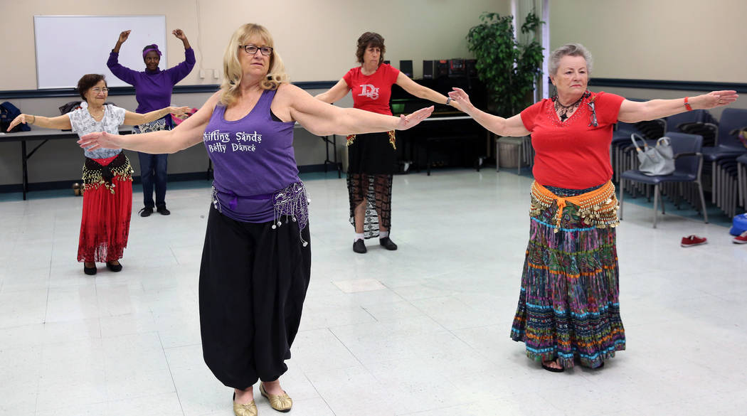 Ann Harris, front left, Mary Ann Teixeira, 76, right, Guadalupe Villa Lyons, 70, back left, Gloria Postal, 58, second left, and Roberta Culmone, 71, second right, belly dance at Las Vegas Senior C ...