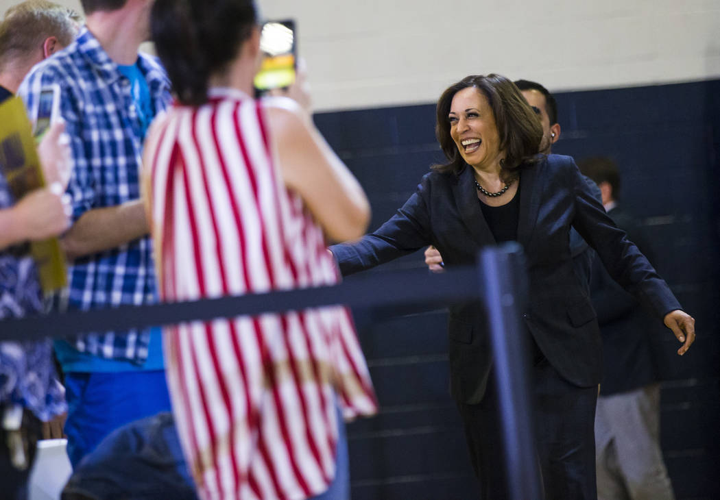 U.S. Sen. Kamala Harris, D-Calif., a Democratic presidential hopeful, greets supporters at a campaign rally at Canyon Springs High School in North Las Vegas on Friday, March 1, 2019. (Chase Steven ...