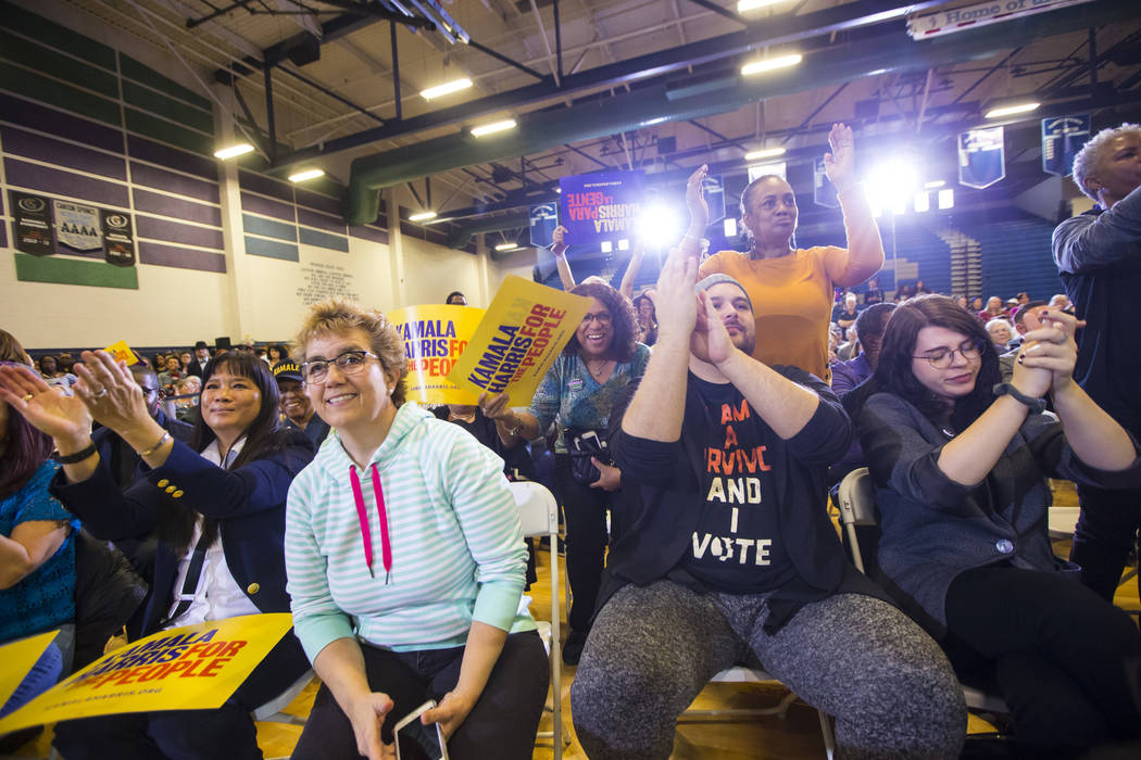 Supporters cheer as U.S. Sen. Kamala Harris, D-Calif., a Democratic presidential hopeful, not pictured, speaks during a campaign rally at Canyon Springs High School in North Las Vegas on Friday, M ...