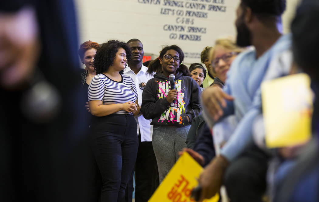A student asks a question as U.S. Sen. Kamala Harris, D-Calif., a Democratic presidential hopeful, not pictured, answers questions during a campaign rally at Canyon Springs High School in North La ...