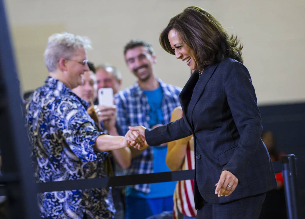 U.S. Sen. Kamala Harris, D-Calif., a Democratic presidential hopeful, greets supporters at a campaign rally at Canyon Springs High School in North Las Vegas on Friday, March 1, 2019. (Chase Steven ...