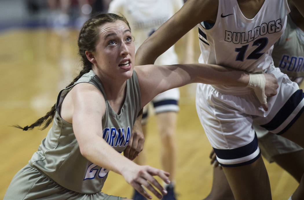 Bishop Gorman senior Lexi Kruljac (22) boxes out Centennial junior Aishah Brown (12) in the second quarter of the Class 4A girls state championship game on Friday, March 1, 2019, at Orleans Arena, ...