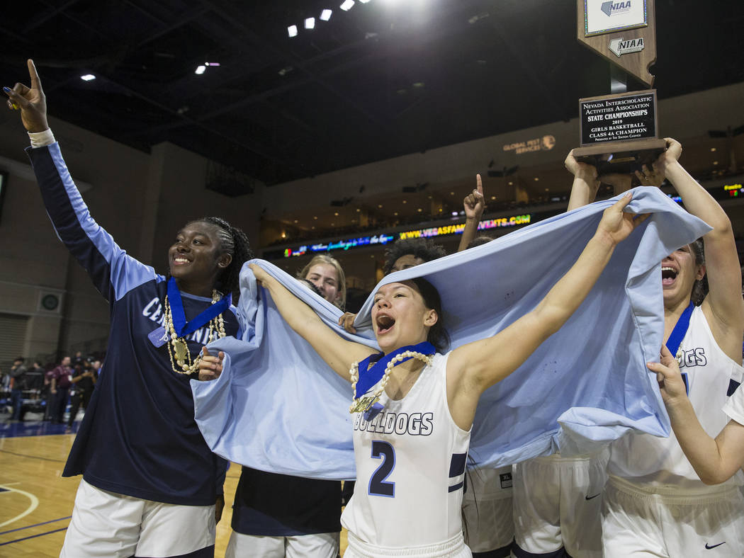 Centennial celebrates after beating Bishop Gorman 78-47 to win the Class 4A girls state championship on Friday, March 1, 2019, at Orleans Arena, in Las Vegas. (Benjamin Hager Review-Journal) @Benj ...