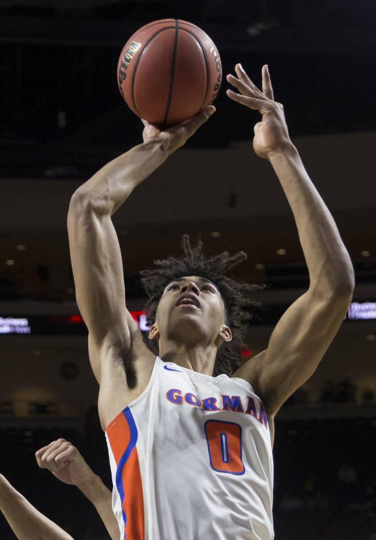 Bishop Gorman junior forward Isaiah Cottrell (0) converts a fast-break layup in the fourth quarter during the Gaels Class 4A boys state championship game with Clark on Friday, March 1, 2019, at Or ...