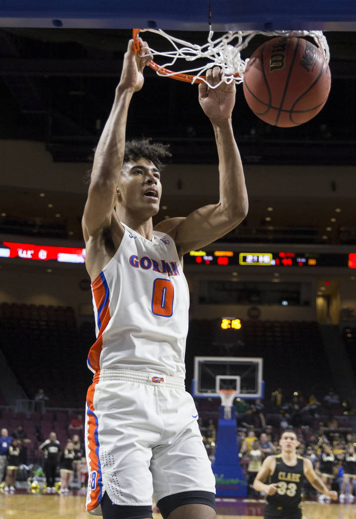 Bishop Gorman junior forward Isaiah Cottrell (0) converts a fast-break dunk in the fourth quarter during the Gaels Class 4A boys state championship game with Clark on Friday, March 1, 2019, at Orl ...