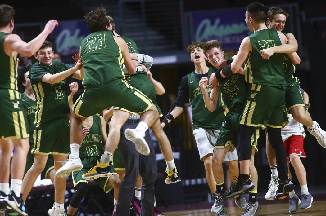 Incline players celebrate their win over The Meadows in the Class 2A boys basketball state championship game at the Orleans Arena in Las Vegas on Saturday, March 2, 2019. (Chase Stevens/Las Vegas ...