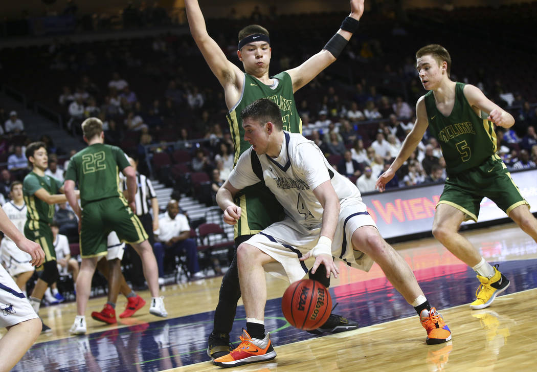 The Meadows forward Joe Epstein (4) moves the ball against Incline's TT Valosek during the second half of the Class 2A boys basketball state championship game at the Orleans Arena in Las Vegas on ...