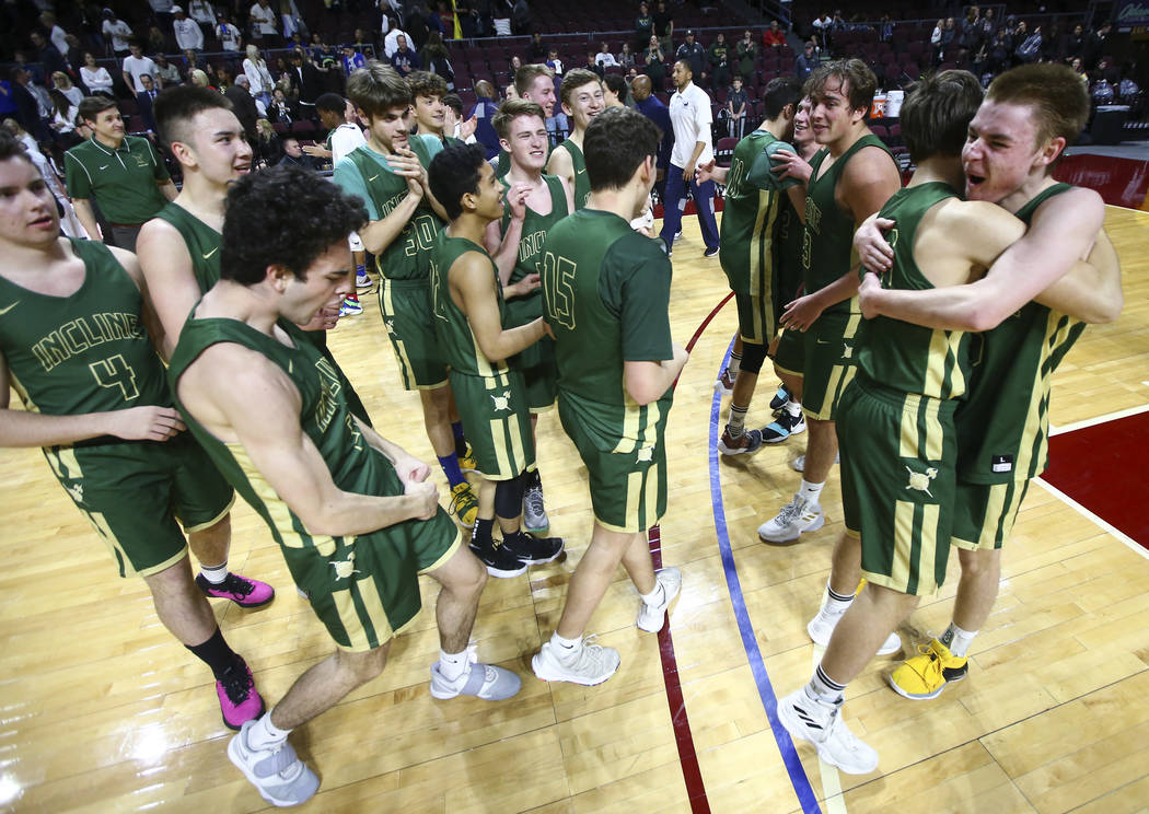 Incline players celebrate their win over The Meadows in the Class 2A boys basketball state championship game at the Orleans Arena in Las Vegas on Saturday, March 2, 2019. (Chase Stevens/Las Vegas ...