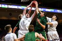 The Meadows forward Joe Epstein (4) reaches out for a rebound against Incline guard Brody Thralls (15) during the first half of the Class 2A boys basketball state championship game at the Orleans ...