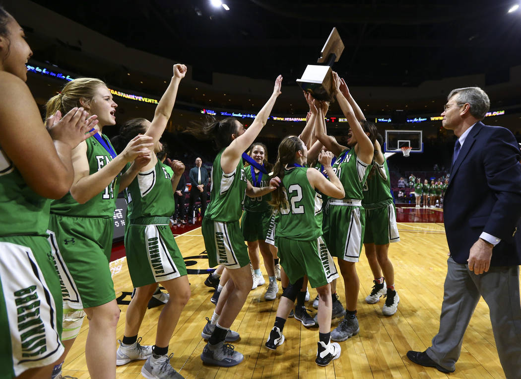 Churchill County players celebrate their win against Moapa Valley in the Class 3A girls basketball state championship game at the Orleans Arena in Las Vegas on Saturday, March 2, 2019. (Chase Stev ...