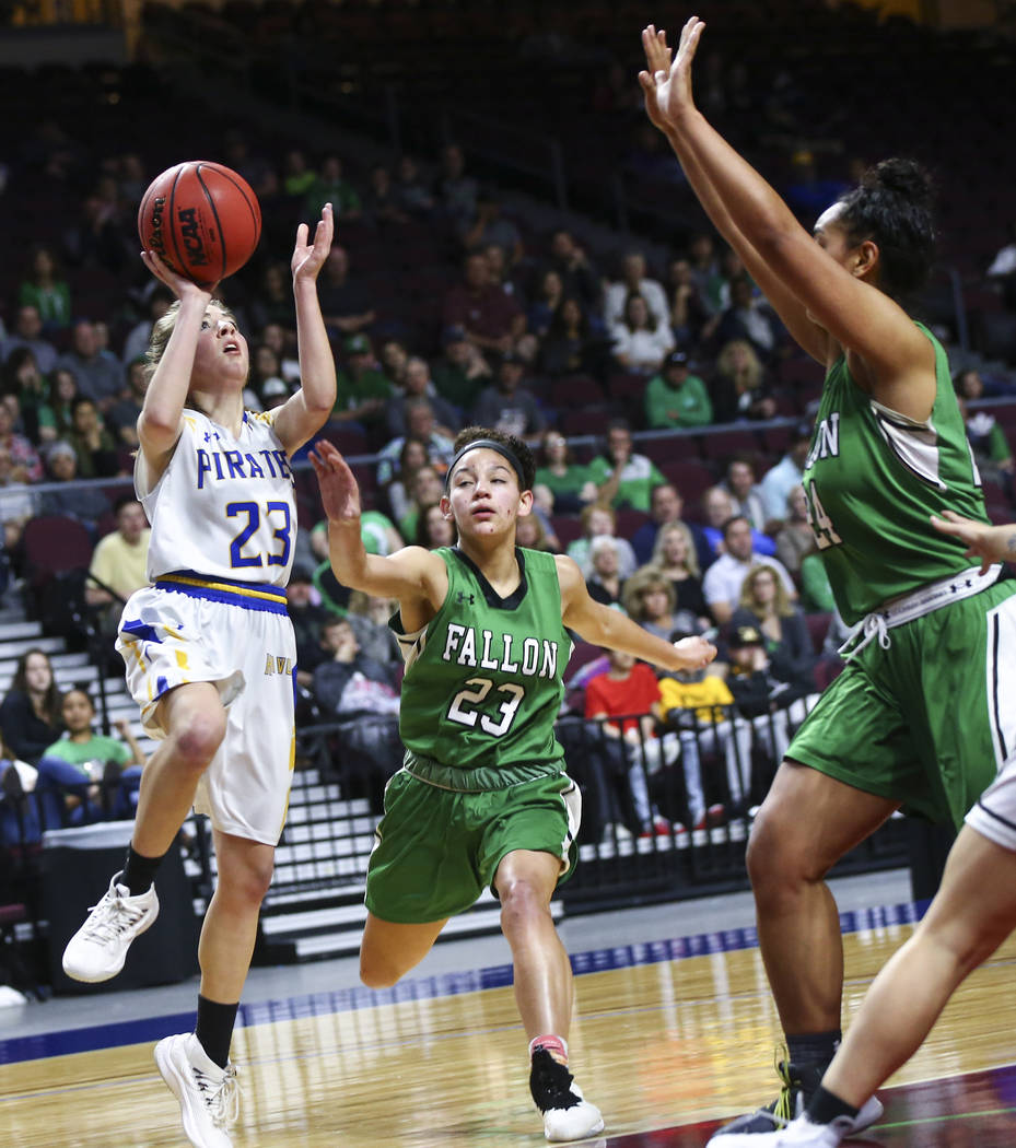 Moapa Valley's Emma Humes (23) shoots against Churchill County's Madison Whitaker (23) during the first half of the Class 3A girls basketball state championship game at the Orleans Arena in Las Ve ...