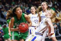 Churchill County's Leilani Otuafi goes to the basket against Moapa Valley's Kaitlyn Anderson during the second half of the Class 3A girls basketball state championship game at the Orleans Arena in ...