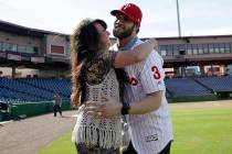 Bryce Harper, right, hugs his mother Sheri after being introduced as a Philadelphia Phillies player during a news conference at the Philadelphia Phillies spring training baseball facility, Saturda ...