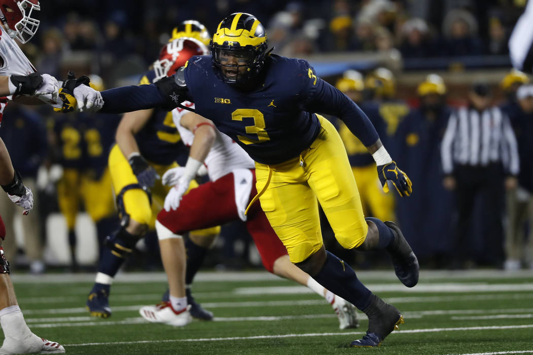 Michigan defensive lineman Rashan Gary (3) rushes against Indiana in the second half of an NCAA college football game in Ann Arbor, Mich., Saturday, Nov. 17, 2018. (AP Photo/Paul Sancya)