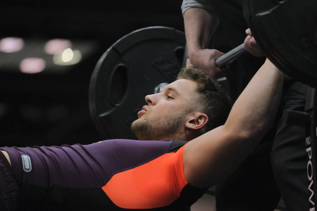Ohio State defensive lineman Nick Bosa does the bench press drill at the NFL football scouting combine in Indianapolis, Thursday, Feb. 28, 2019. (AP Photo/AJ Mast)