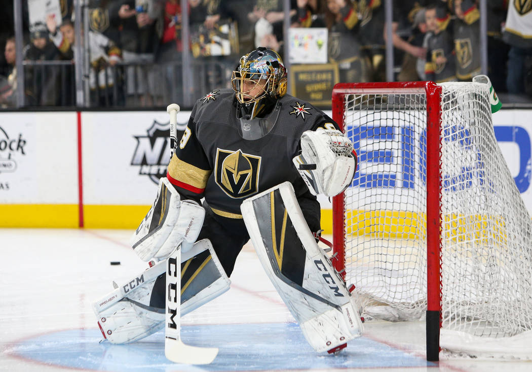 Vegas Golden Knights goaltender Marc-Andre Fleury (29) stops a shot on goal during warmups of an NHL hockey game at T-Mobile Arenain Las Vegas, Sunday, March 3, 2019. (Caroline Brehman/Las Vegas R ...