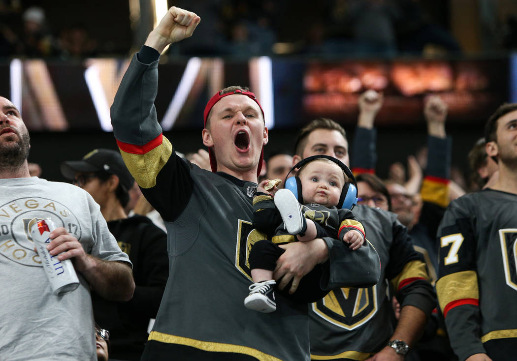 Fans cheer after Vegas Golden Knights center Ryan Carpenter (40) scores against the Vancouver Canucks during the second period of an NHL hockey game at T-Mobile Arena in Las Vegas, Sunday, March 3 ...
