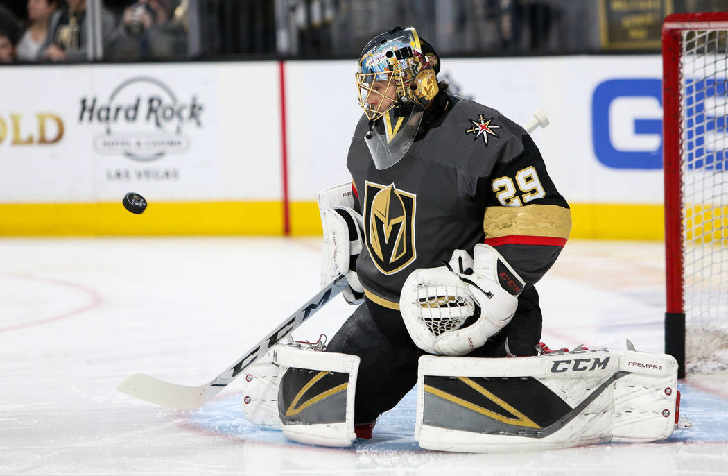 Vegas Golden Knights goaltender Marc-Andre Fleury (29) saves a shot on goal during warmups of an NHL hockey game at T-Mobile Arenain Las Vegas, Sunday, March 3, 2019. (Caroline Brehman/Las Vegas R ...
