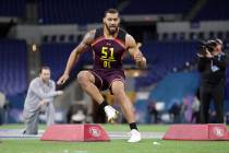Mississippi State defensive lineman Montez Sweat runs a drill at the NFL football scouting combine in Indianapolis, Sunday, March 3, 2019. (AP Photo/Michael Conroy)