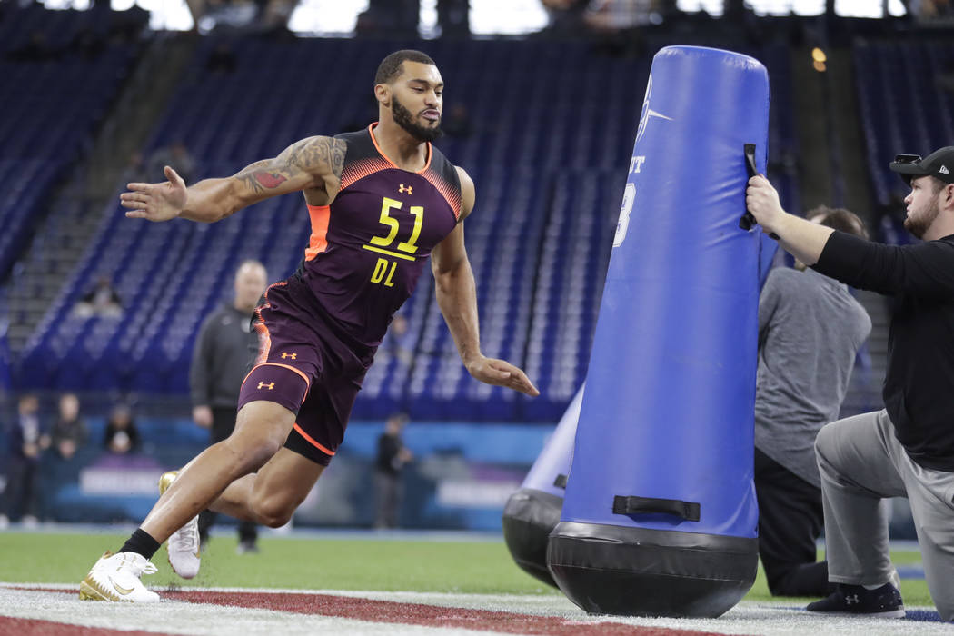 Mississippi State defensive lineman Montez Sweat runs a drill at the NFL football scouting combine in Indianapolis, Sunday, March 3, 2019. (AP Photo/Michael Conroy)