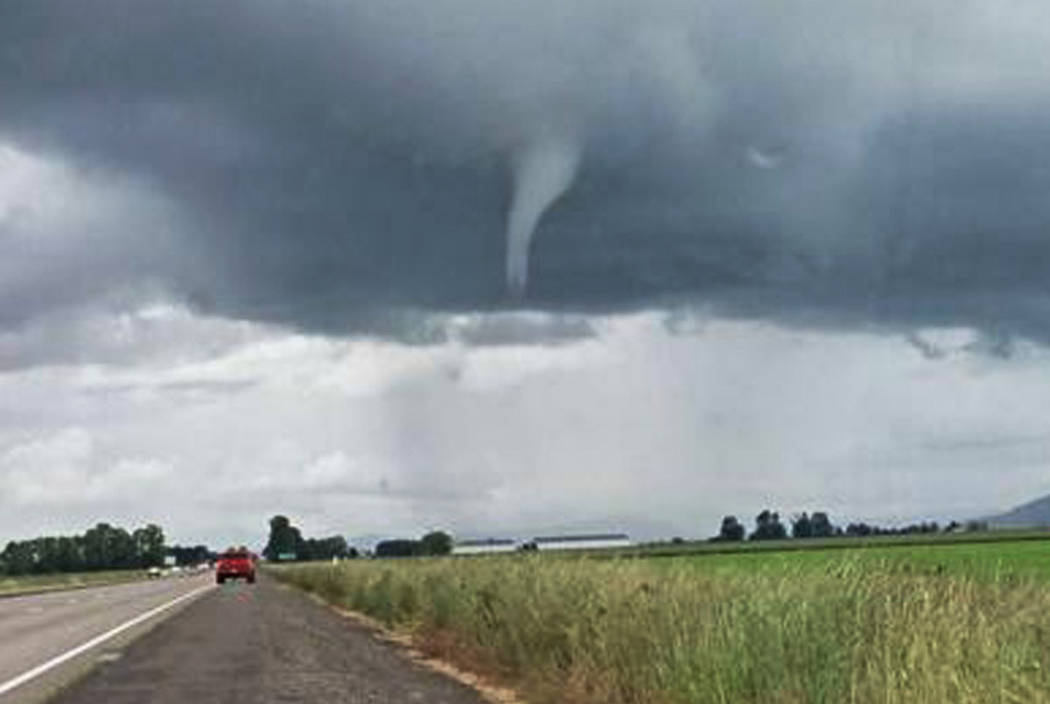 This photo provided by James Lally shows a funnel-shaped cloud on I-10 near Marianna, Fla., Sunday, March 3, 2019. Numerous tornado warnings were posted across parts of Alabama, Georgia, Florida ...