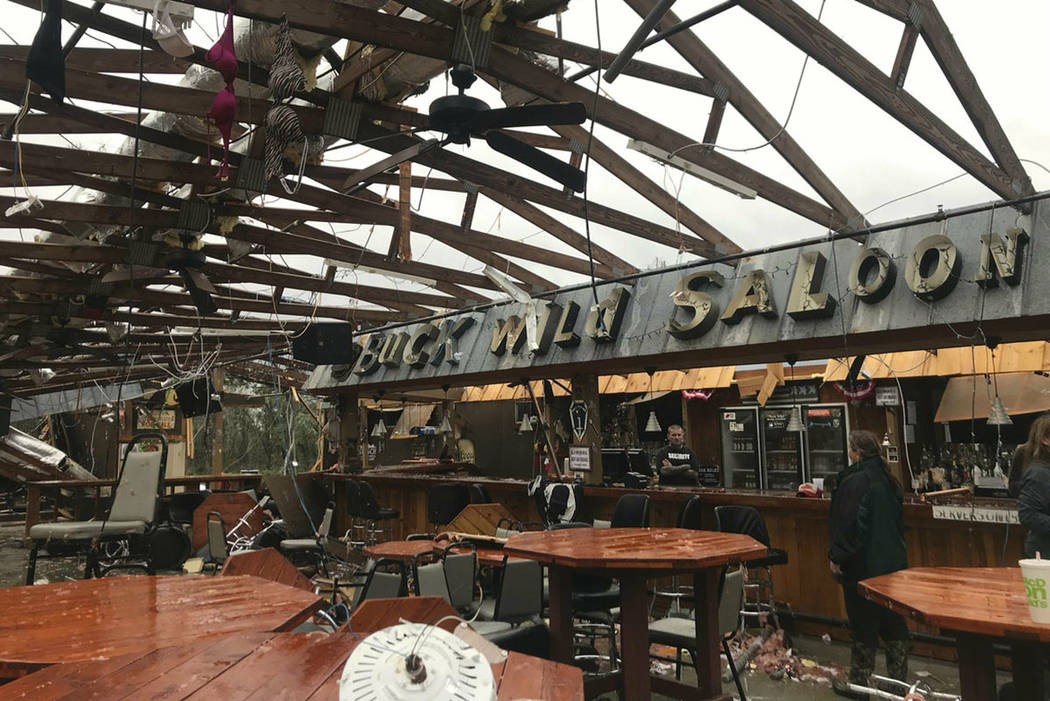 This photo shows some damage at the Buck Wild Saloon, located on U.S. Highway 280, east of Smiths Station, Ala., Sunday, March 3, 2019, after a powerful storm system passed through the area. (Kara ...