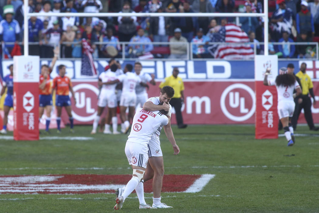 USA's Brett Thompson and Steve Tomasin (9) celebrate their victory over Samoa in the Cup Final during the USA Sevens Rugby Tournament at Sam Boyd Stadium in Las Vegas on Sunday, March 3, 2019. (Ch ...