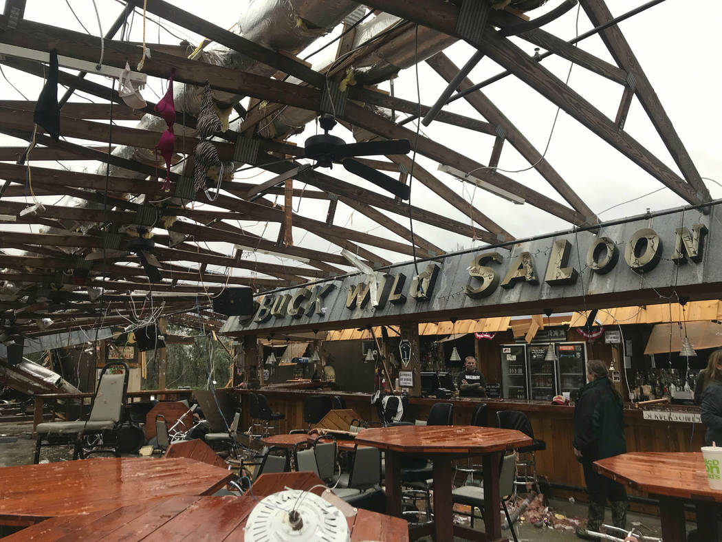 This photo shows some damage at the Buck Wild Saloon, located on U.S. Highway 280, east of Smiths Station, Ala., Sunday, March 3, 2019, after a powerful storm system passed through the area. (Kara ...