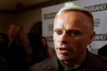 British musician Keith Flint of Prodigy talks to the media after winning the best single for 'Omen' at the Kerrang Awards 2009, at the Brewery in London, Monday, Aug. 3, 2009. (AP Photo/Joel Ryan)