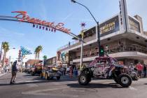 The Mint 400 Vehicle Procession rounds the turn from Las Vegas Boulevard onto East Fremont Street on March 9, 2016. Vehicles are arriving for the official kickoff of the annual Mint 400 off-road r ...