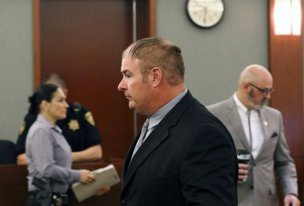 A former Las Vegas fire Capt. Richard Loughry, 48, leaves the courtroom at the Regional Justice Center on Monday, March 4, 2019, in Las Vegas. Loughry pleaded guilty to two felonies after authorit ...