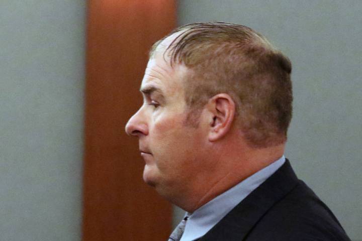 A former Las Vegas Fire Capt. Richard Loughry, 48, leaves the courtroom at the Regional Justice Center on Monday, March 4, 2019, in Las Vegas. Loughry pleaded guilty to two felonies after authori ...