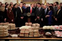 President Donald Trump welcomes the 2018 NCAA FCS College Football Champions, The North Dakota State Bison, to the State Dining room of the White House in Washington, Monday, March 4, 2019, with M ...