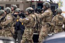 The FBI searches the home of Stephen Beal in Long Beach, Calif., Sunday, March 3, 2019, after taking him into custody in connection with a 2018 bombing at an Aliso Viejo beauty salon that killed h ...