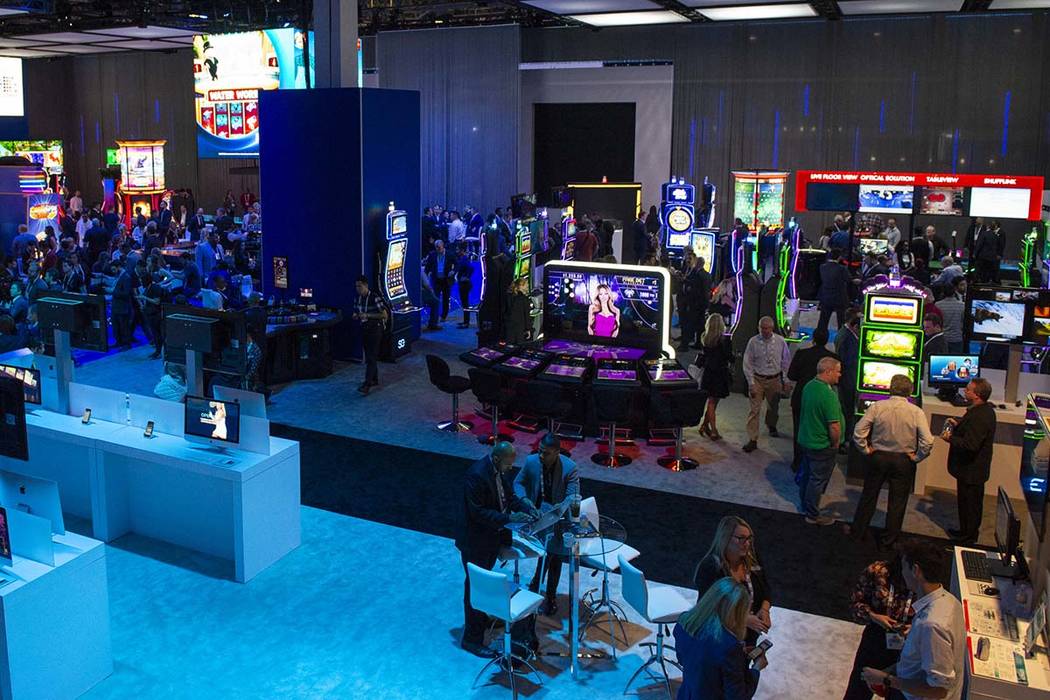 Scientific Games showcases their new games and technology behind a wall surrounding the booth to offer a better user experience at the 18th annual Global Gaming Expo at Sands Expo and Convention C ...