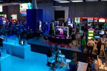 Scientific Games showcases their new games and technology behind a wall surrounding the booth to offer a better user experience at the 18th annual Global Gaming Expo at Sands Expo and Convention C ...