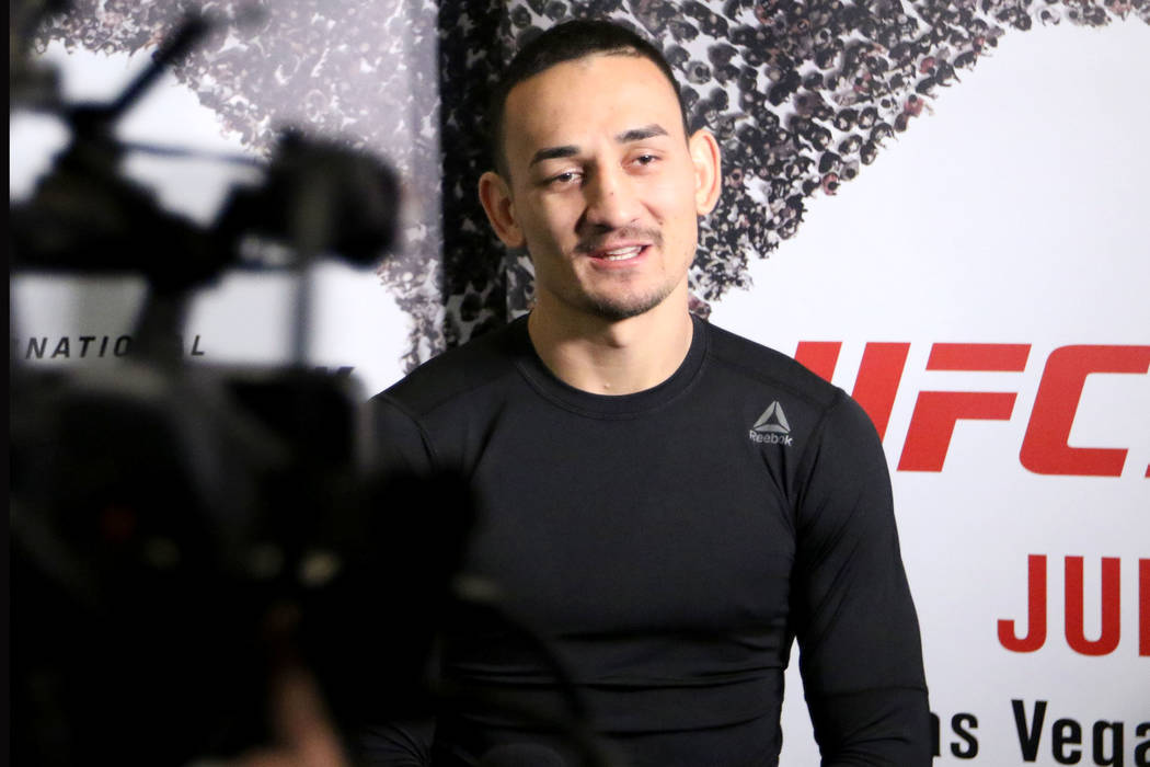 UFC featherweight champion Max Holloway answers questions from reporters at a media day ahead of UFC 226 at the MGM Grand in Las Vegas, Wednesday, July 4, 2018. Heidi Fang Las Vegas Review-Journal ...