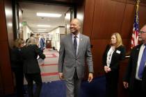 Attorney General Aaron Ford walks into the Assembly chamber in the Legislative Building in Carson City on the first day of the 80th session of the Nevada Legislature Monday, Feb. 4, 2019. (K.M. Ca ...
