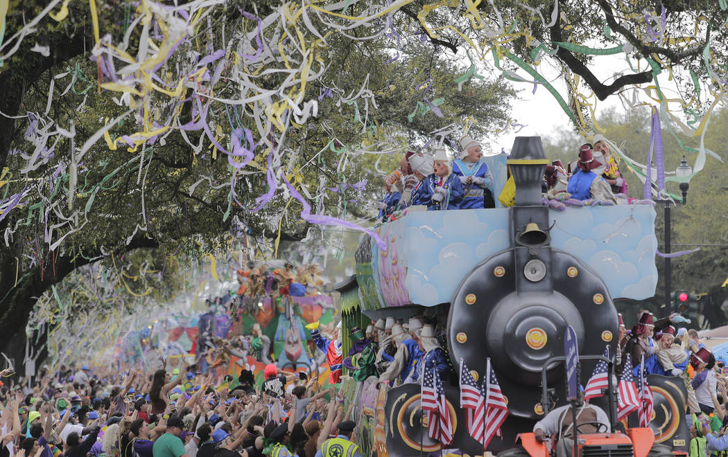 The Krewe of Thoth rolls along the Uptown route in New Orleans, La. Sunday, March 3, 2019. Founded in 1947, the Krewe of Thoth is named for the Egyptian Patron of Wisdom and Inventor of Science, A ...
