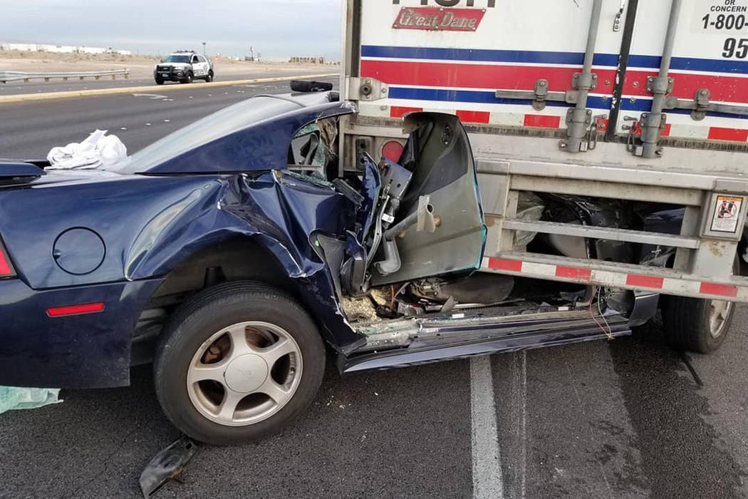 Las Vegas police investigate a crash on Las Vegas Boulevard South near Robindale Road, Tuesday, March 5, 2019. Two people were injured and taken to a hospital. (@LVMPD_Traffic/Twitter))